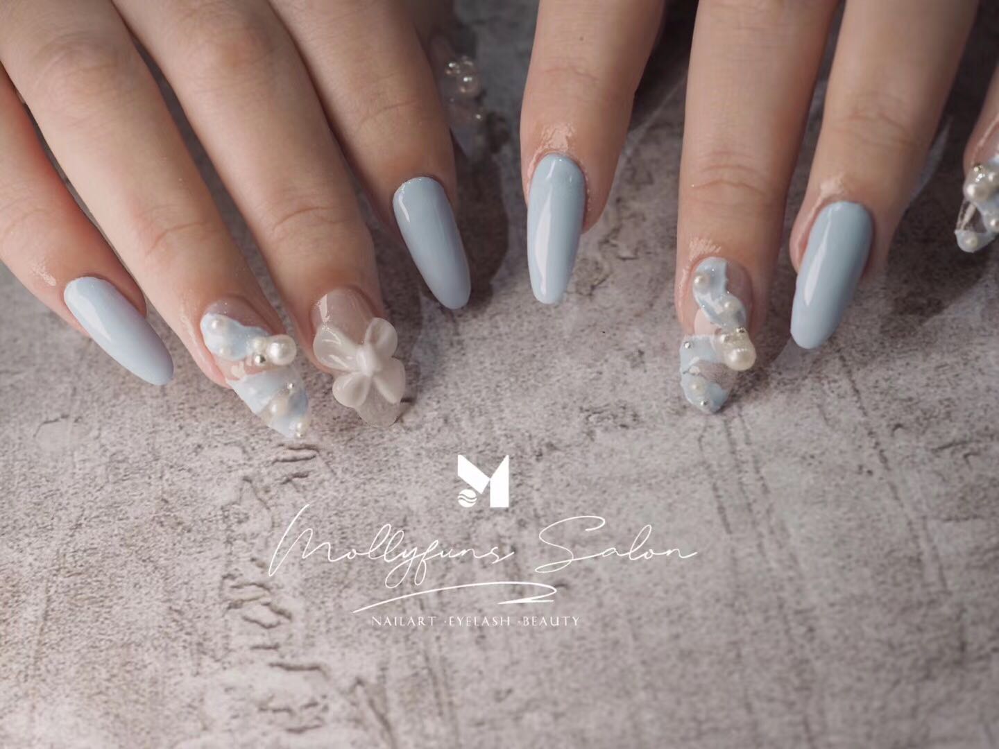Powder-blue coffin nails with 3D bows and pearls