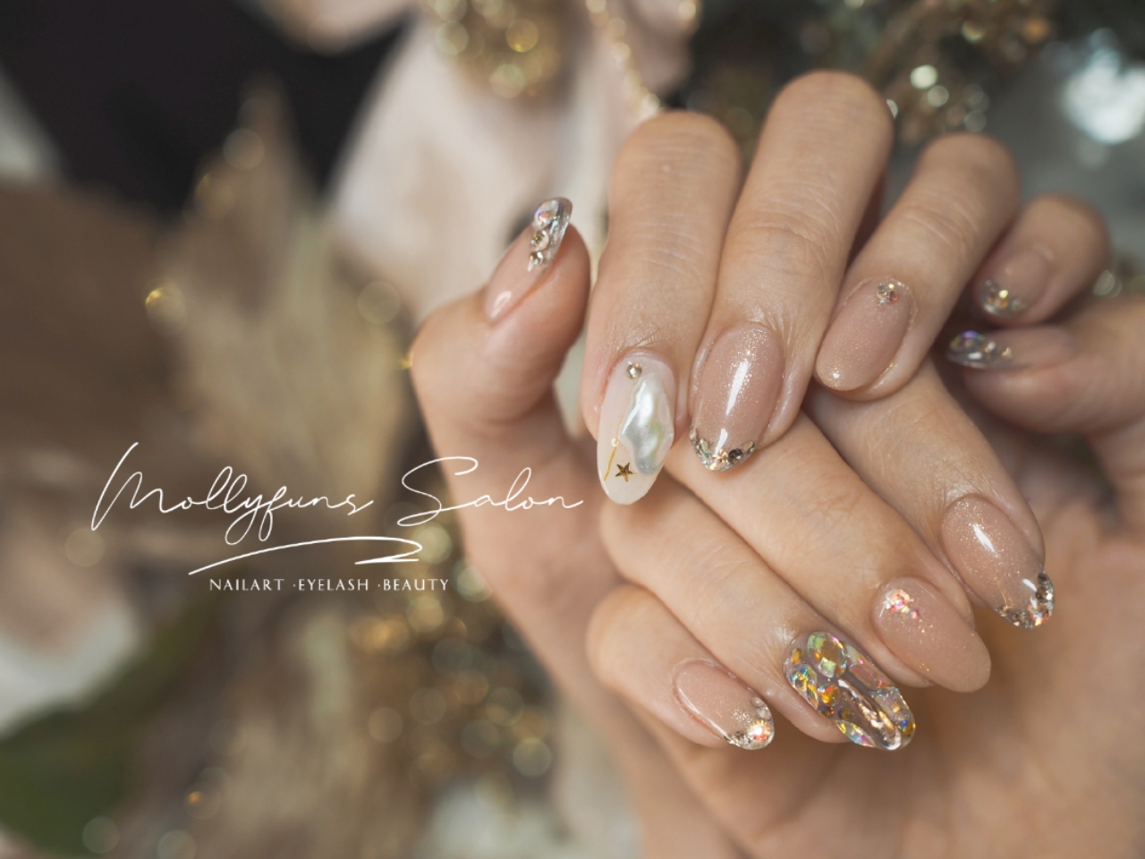 Champagne glitter nails with pearls and stars